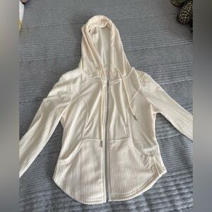 Super cute and soft cream colored cropped zip up jacket